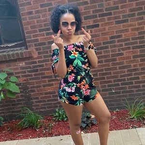 Black/floral patterned romper.